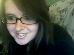 A British hoochie shows off her dripping breasts and cock.